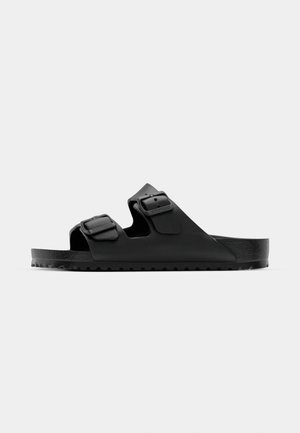 Black sandals with two adjustable straps, made of synthetic material. Features textured footbed and durable rubber sole with grip.