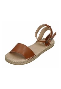 Brown leather sandal with a wide strap, open toe, and adjustable ankle strap. Jute detail along the sole adds texture. Flat design.