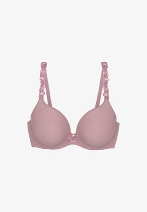 Soutien-gorge rose clair avec des cups lisses, garniture en dentelle décorative sur les bretelles et un petit accent doré au centre. Bretelles réglables et fermeture par crochet.