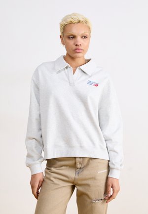 Gray pullover sweatshirt with a polo collar, featuring blue and red logo embroidery on the left chest, and ribbed cuff accents.