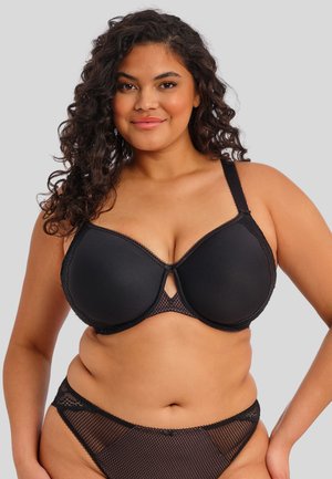 Black underwire bra featuring molded cups, lace trim, and a keyhole design at the center, paired with matching sheer fishnet briefs.