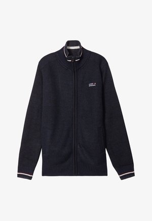 Cardigan zip-up navy in maglia testurizzata, con colletto alto, due tasche frontali e coste a righe su polsini e colletto.