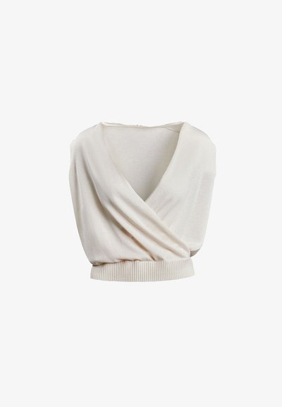 Kremo spalvos megztas be rankovių aptempiamas viršus su gilia V formos iškirpte ir raukšlėtu apvadu.