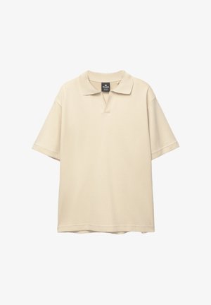 Beige lyhythihainen polo-paita, joka on valmistettu pehmeästä puuvillasta. Klassinen kaulus ja osittain avoin napitus. Sileä pinta, rento istuvuus.