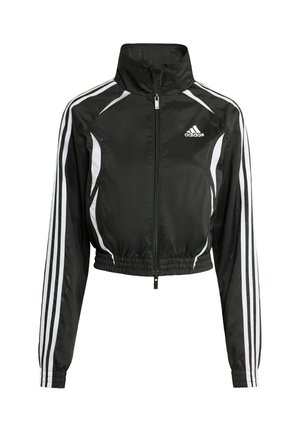 Zwarte cropped jacket van lichtgewicht materiaal met een hoge kraag, volledige rits, witte zijstrepen en een geborduurd logo op de borst.