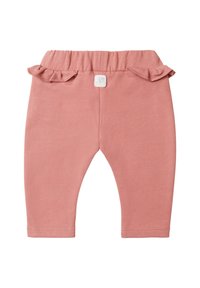Roze katoenen leggings met een elastische tailleband, voorzien van ruches op de heupen en een klein label met een bloemenontwerp aan de voorkant.