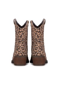 Bottes chelsea imprimé léopard en suède lisse, avec fermeture éclair à l'arrière, petit talon bloc et côtés ouverts. La palette de couleurs présente des motifs beiges et noirs.