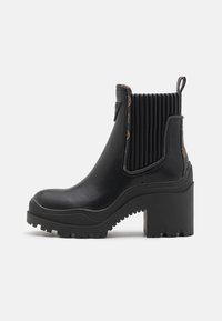 Guess YVETTE - Bottines à plateau - black