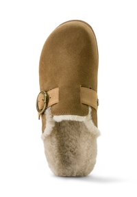 Brown suede slip-on slipper with a fuzzy cream interior, featuring a tan strap and a gold circular buckle detail.