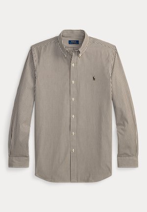 Langærmet skjorte med knapper med lodrette brune og hvide striber, knappet krave og Polo Ralph Lauren logo på venstre bryst.