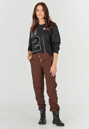 JANE - Pantaloni - brown
