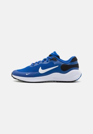 Scarpe da ginnastica blu con materiale in rete, baffo Nike bianco, dettagli neri, forma arrotondata e suola texturizzata per aderenza.
