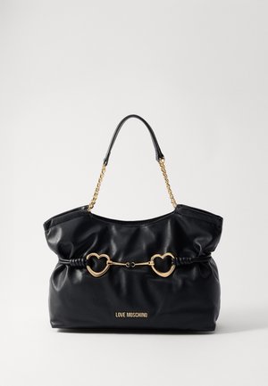 Black leather Love Moschino handbag with gold heart-shaped chain details and a short black and gold strap.