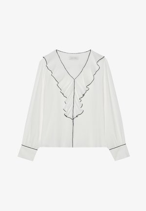White blouse with a V-neck, featuring a ruffled front and black trim. Long sleeves with buttoned cuffs, made from lightweight material.