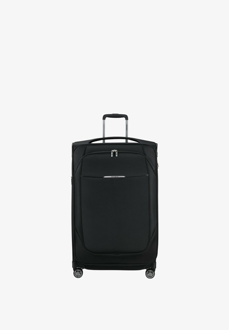 Valise noire avec coque rigide, fermeture éclair, poignée supérieure et trolley rétractable. Comprend quatre roues pour la mobilité et une poche avant.