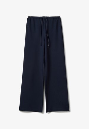 Pantalones de pierna ancha en azul marino con cintura elástica y cordón delantero, hechos de tela suave, extendidos sobre fondo blanco.