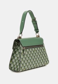 Green handbag with a structured design, featuring a patterned leaf motif, gold hardware accents, and a detachable shoulder strap.
