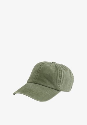 Green cotton baseball cap with a curved brim, featuring stitching details. The design includes ventilation holes and a soft texture.