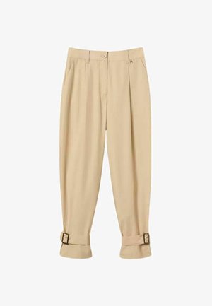 Pantaloni beige a vita alta con pieghe frontali, tasche laterali, chiusura con bottone, passanti per cintura e cinturini regolabili con fibbia ai polsini delle caviglie.