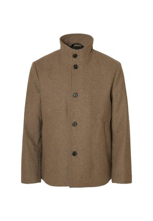 Brūna vilnas auduma mētelis ar augstu apkakli, pieciem melniem pogām un sānu kabatām. Ievērojama taisna griezuma un gluda tekstūra.