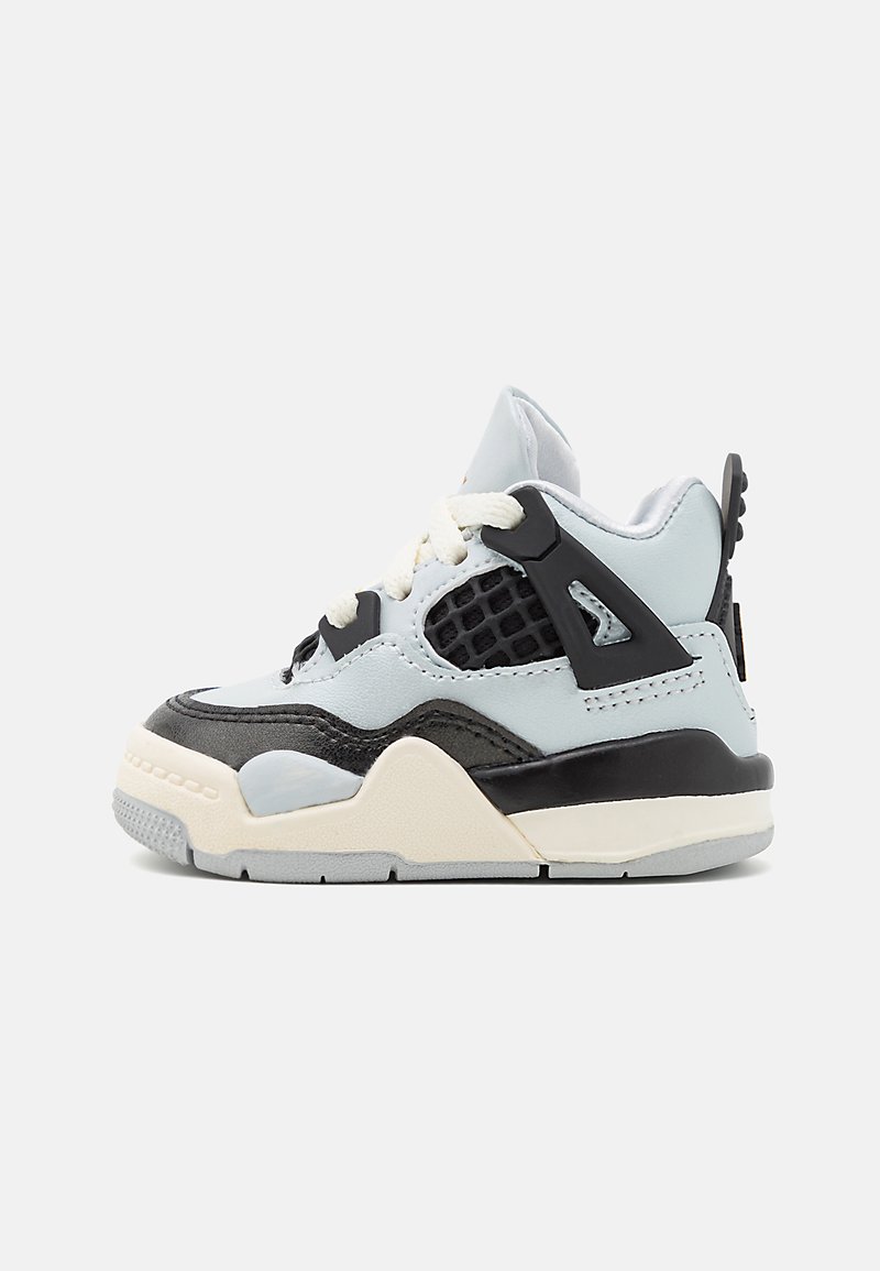 Blue and black toddler sneaker with mesh accents, textured overlay, and beige sole. Features white laces and a logo on the side.