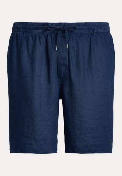 Navy zila lina shorti ar elastīgu jostu un auklu. Iespējas gluda tekstūra un brīvs piegriezums, piemērots ikdienas valkāšanai.