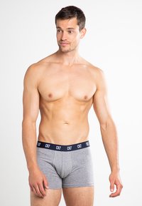 Gray cotton boxer briefs with a navy waistband featuring "CR7" branding. The design is fitted, smooth-textured, and mid-rise.