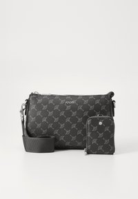 Black leather crossbody bag with a patterned design, silver hardware, and detachable cardholder. Includes a detachable shoulder strap.