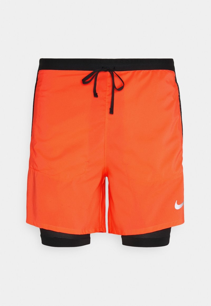 Nike Performance Pantalón corto de deporte - apricot