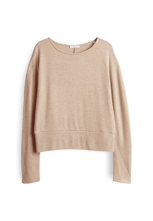 Pull cropped à manches longues beige avec un motif de tricot texturé, présentant un col rond et une coupe décontractée à l'ourlet.