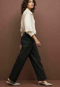 Next PONTE BARREL LEG - REGULAR FIT - Stoffhose - black