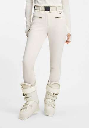 - Spodnie materiałowe