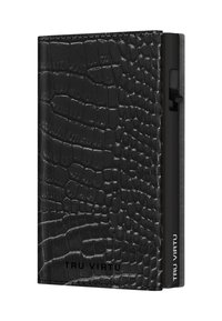 Black leather wallet with a textured crocodile pattern, featuring a side clip and engraved logo "TRU VIRTU" on the front. Compact rectangular shape.