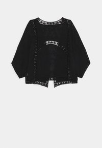 Sort blonde top med lange ærmer, der har et gennemsigtigt blomstermønster, bølgede kanter og et løst, åbent design foran.