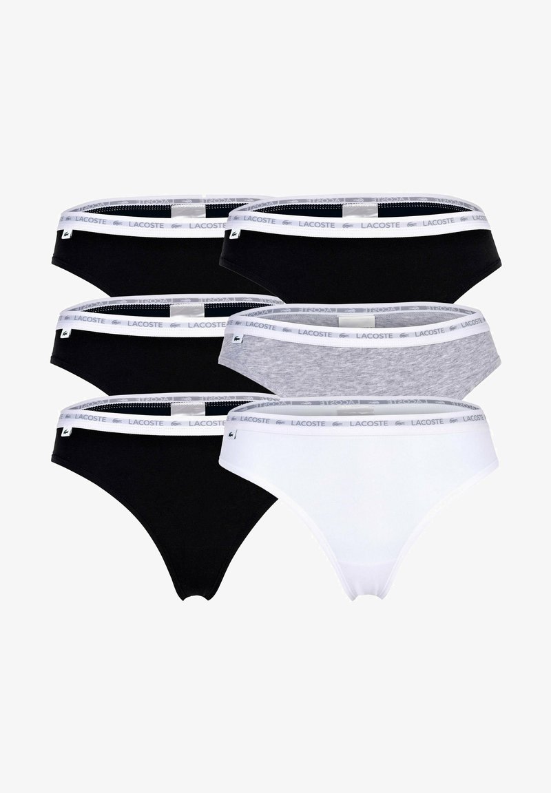 Seis pares de bragas para mujer en negro, blanco y gris, con un tejido suave, cinturilla elástica y acento del logo de Lacoste.