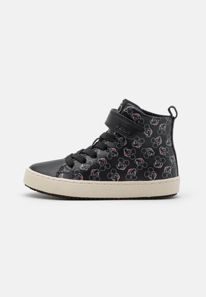 Black high-top sneaker with white sole, featuring multiple Mickey Mouse face prints and a Velcro strap above black laces.