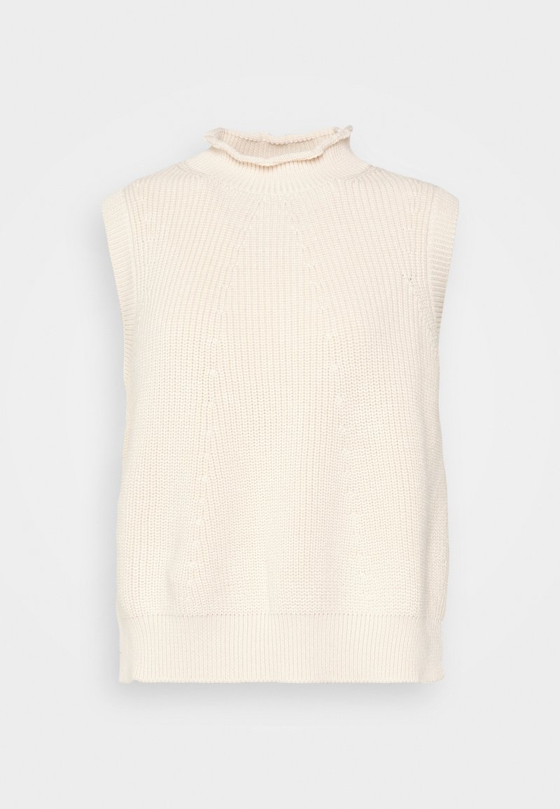 Ärmlös gräddfärgad tröja med hög krage, texturerat stickat mönster och ribbad nederkant. Har en volangkant vid kragen för extra detalj.