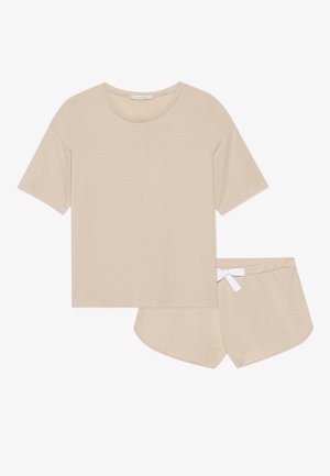 Beige cotton loungewear set featuring a short-sleeve T-shirt with a round neck and matching shorts with a white drawstring waistband.
