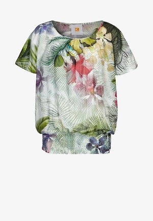 Blouse à motif floral avec des manches courtes, un col rond et une taille élastique. Les couleurs incluent le vert, le rouge, le rose et le violet.