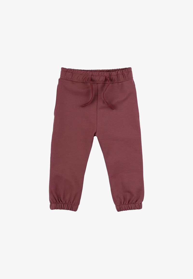 Bordo trenirke izrađene od mekanog materijala, sa elastičnim pojasom, vezicom i elastičnim manžetama na gležnjevima.