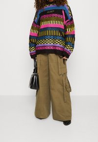The Ragged Priest Pullover - multi-coloured
