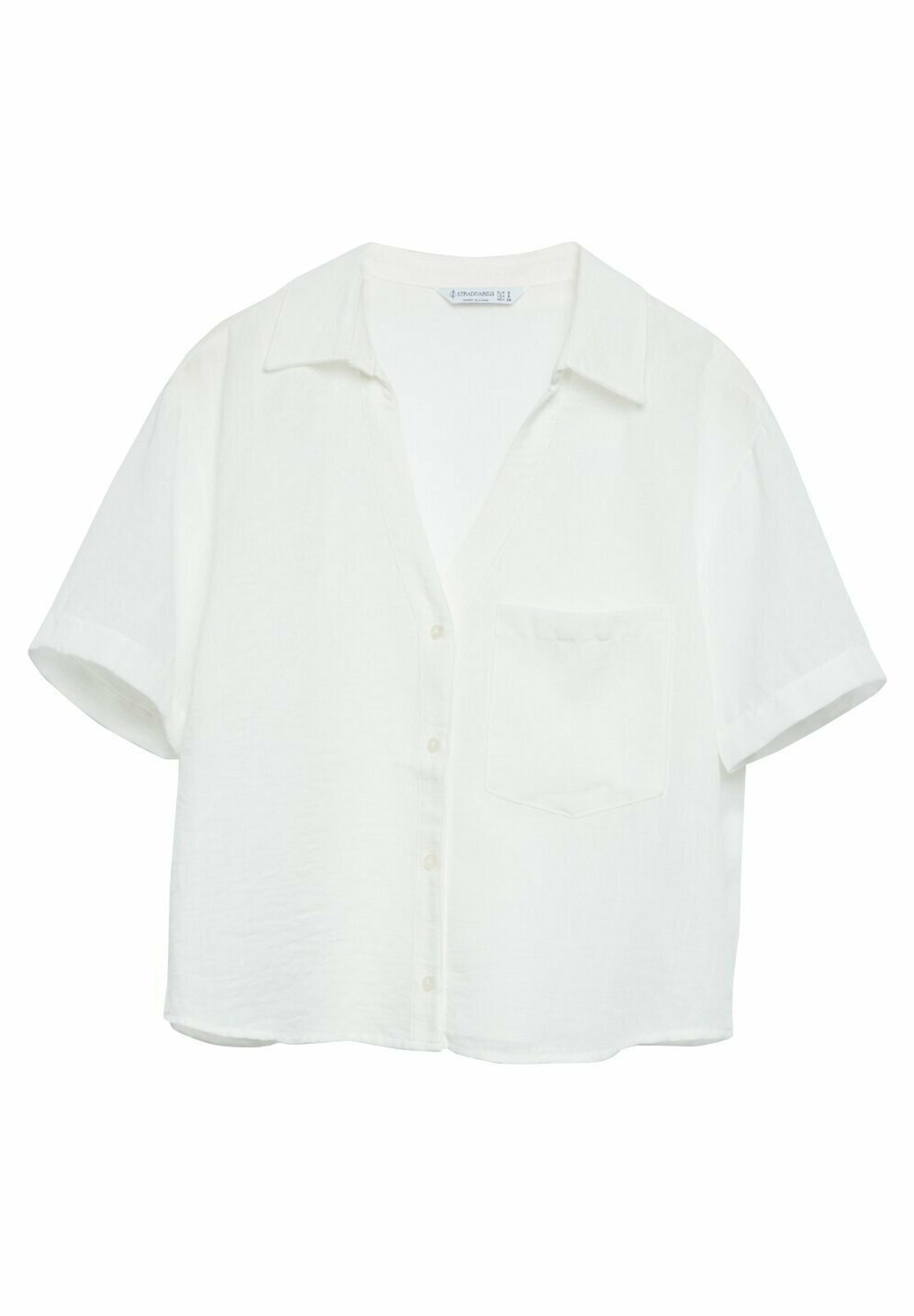Off-white shirt blouse