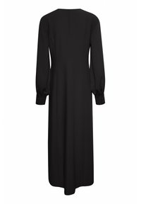 Vestido negro de manga larga con un cuello alto, silueta fluida y puños abotonados. Tejido suave con un diseño minimalista.