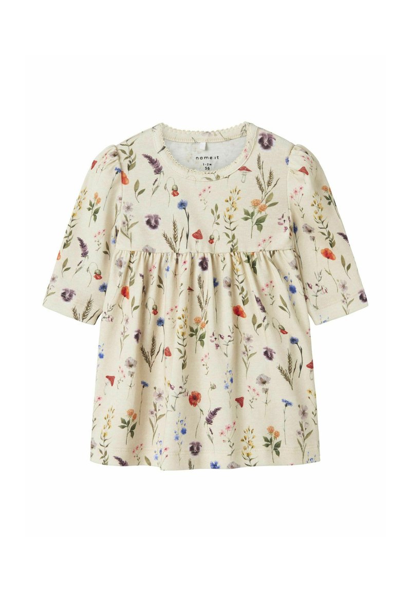 Robe beige clair à manches longues, imprimé floral dans diverses couleurs, taille froncée, encolure ronde et texture subtile.