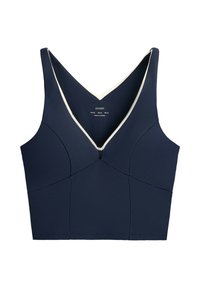Navy blue cropped tank top with deep V-neck and white trim, made from smooth fabric with seam detailing.