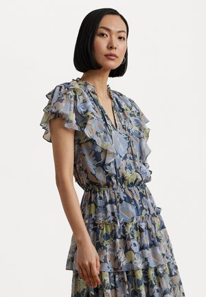Floral maxi dress with ruffled short sleeves, featuring a combination of blue, green, and cream colors in a layered design. Lightweight fabric.