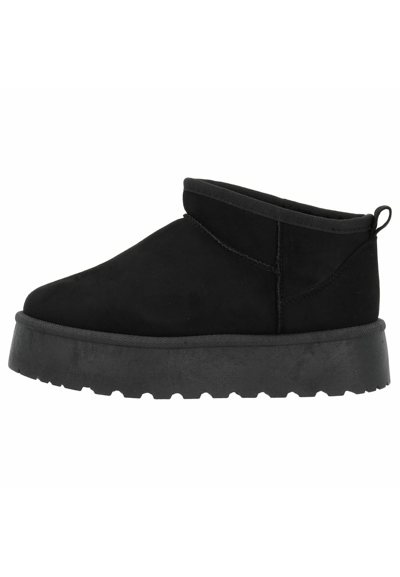Botas de tobillo de ante negro con un diseño elegante, que presentan una puntera redondeada, puño elástico y una suela de goma negra gruesa con un patrón estriado.