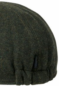 Wool cap in dark green with a textured finish, rounded shape, and gathered band. Features a small logo tag on the side.