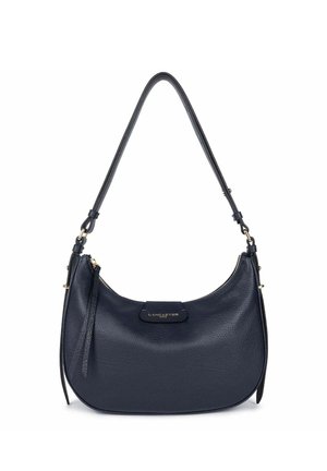 Sac à bandoulière en cuir navy au design courbé, avec des accessoires dorés et un petit détail zippé. Surface texturée avec un patch de logo.