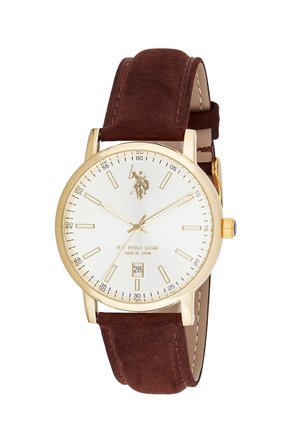 Orologio da polso con cassa in oro, quadrante bianco, indici dorati, datario a ore 6 e cinturino in pelle marrone.